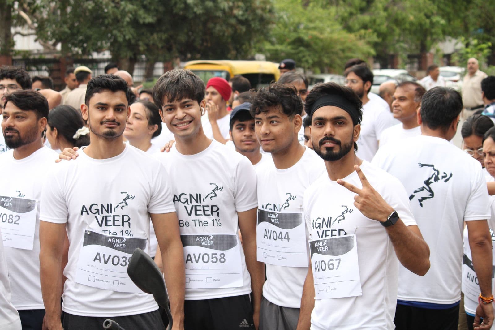 Runners with Indian flags at the Agniveer patriotic themed run in Delhi