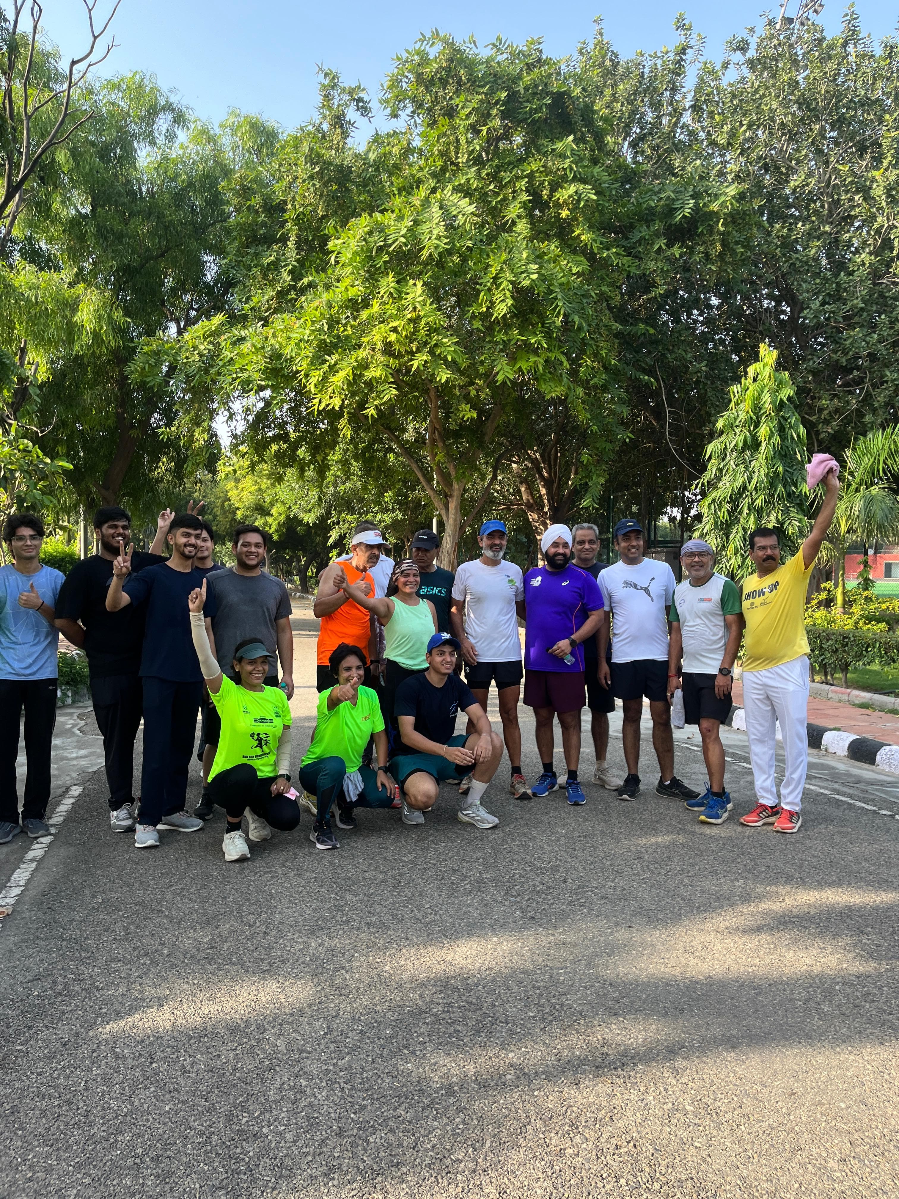 Runners in colorful costumes at Daud-È-Dilli superhero themed running event